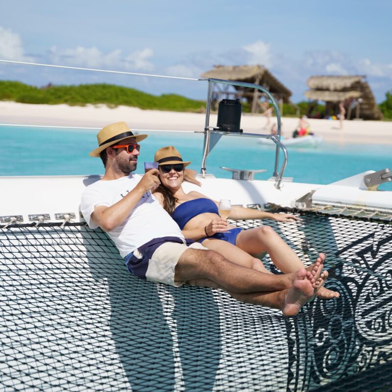 couple relaxing on sundeck boat