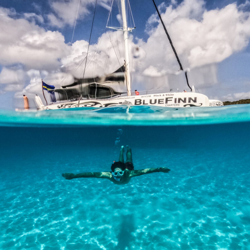 man snorkeling in the water