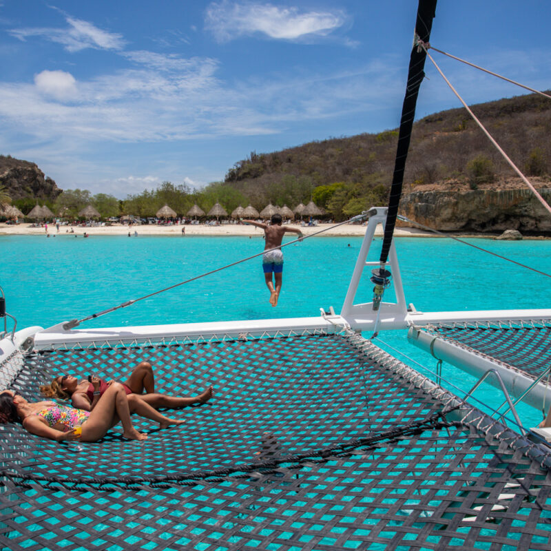 boy jumping in water