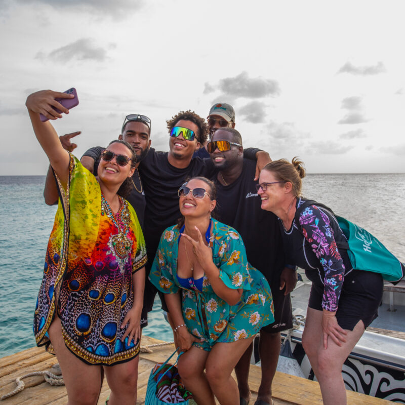 customers taking picture with the crew