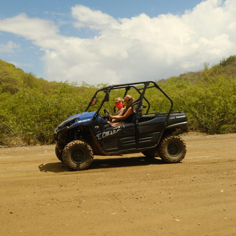 girls riding an atv