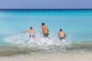 people jumping in the water