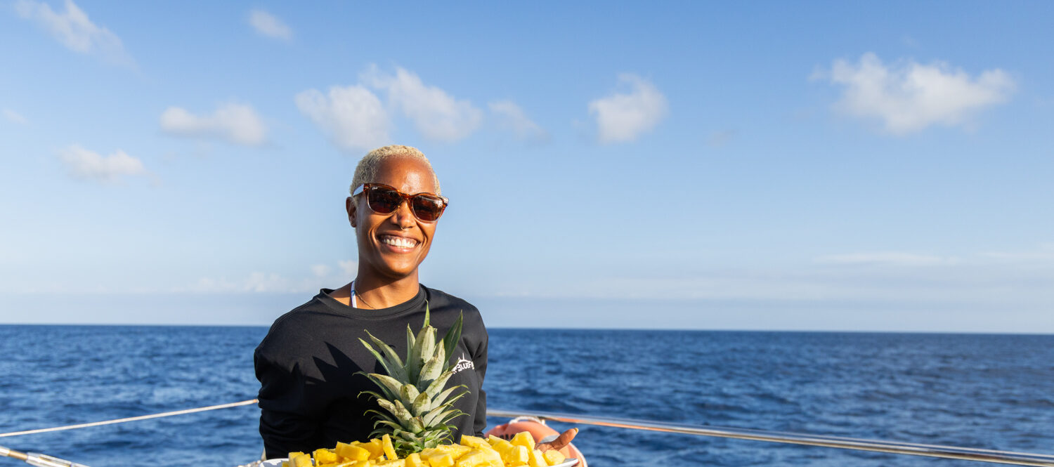 crew member with pineapple