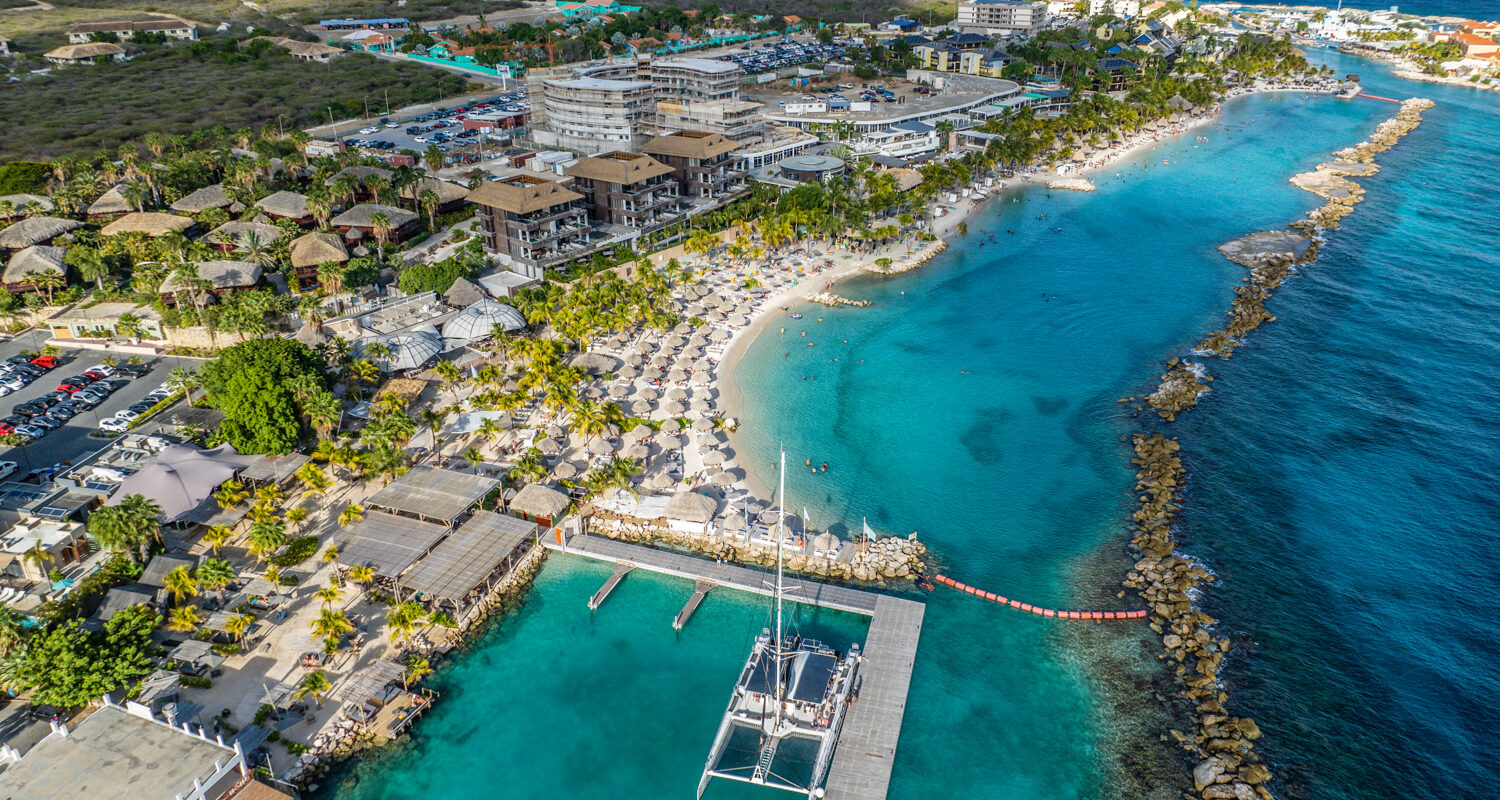 hotel with catamaran in front